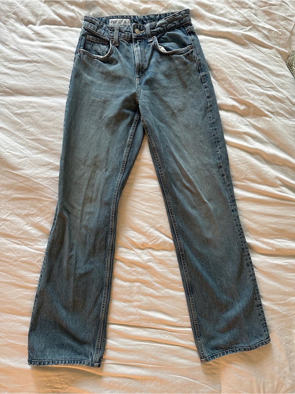 Zara faded blue flare jeans